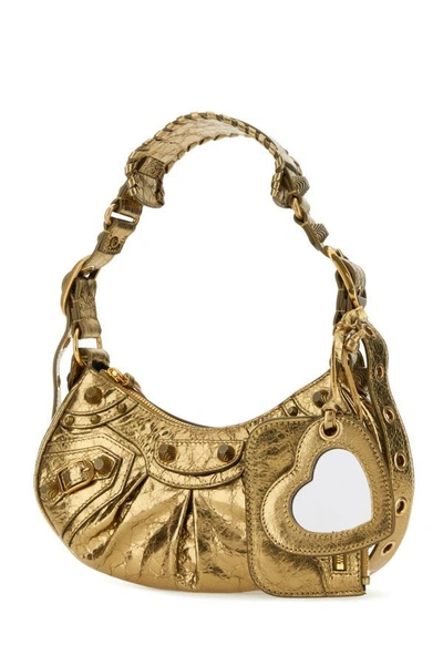 Shop Balenciaga Woman Gold Nappa Leather Le Cagole Xs Shoulder Bag