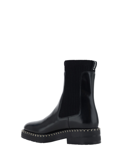 Shop Chloé Noua Ankle Boots In Black