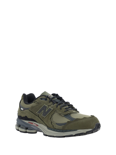 Shop New Balance Protection Pack Sneakers In Dark