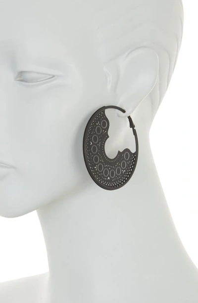 Shop Natasha Medallion Cutout Hoop Earrings In Jet