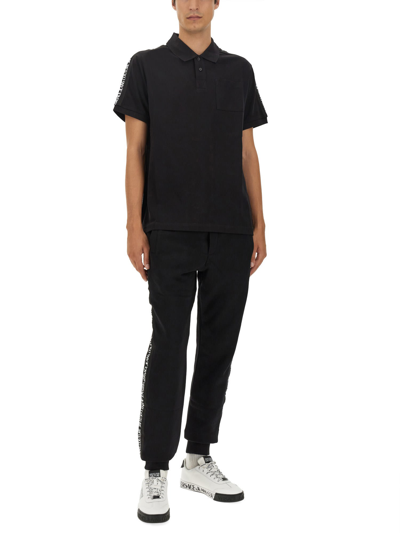 Shop Versace Jeans Couture Regular Fit Polo Shirt In Nero