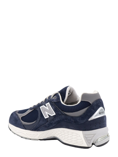 Shop New Balance 2002 Sneakers In Blue