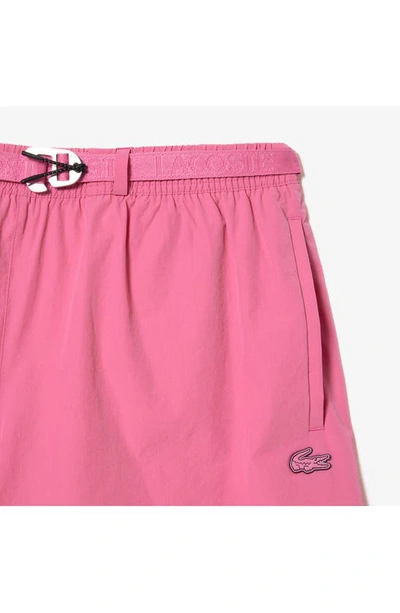 Shop Lacoste Belted Swim Trunks In Reseda Pink