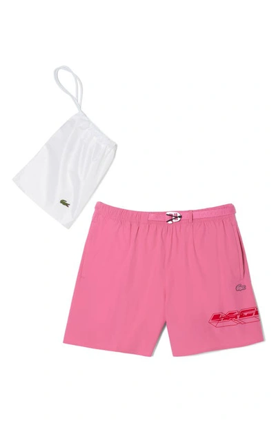 Shop Lacoste Belted Swim Trunks In Reseda Pink