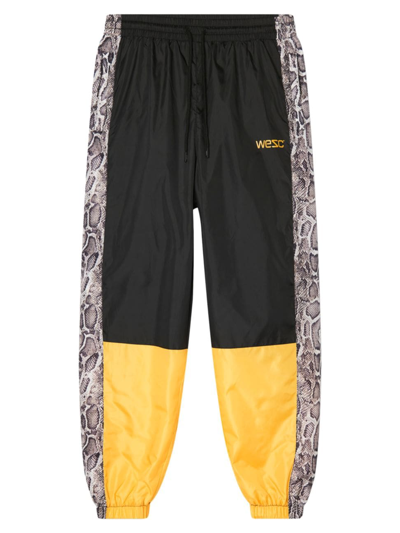 Shop Wesc Men's Colorblocked & Snake Track Pants In Yellow