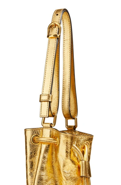 Shop Khaite Small Greta Metallic Shoulder Bag In Gold