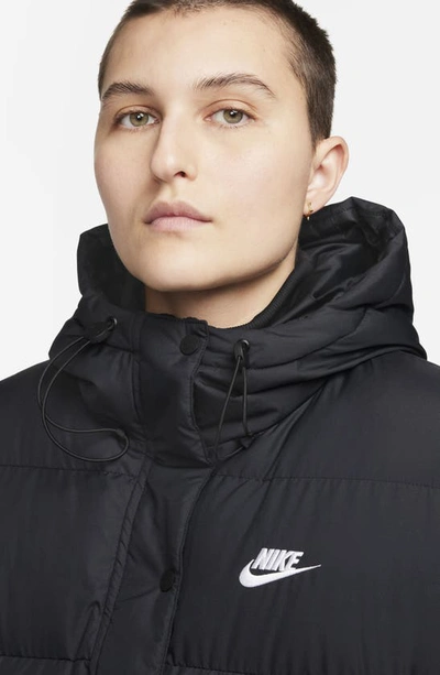Shop Nike Sportswear Water Repellent Down Coat In Black/ White