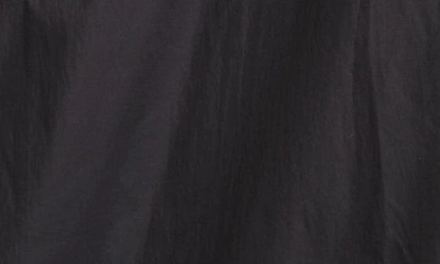 The Row Althena Padded Hooded Quarter-zip Track Jacket In Black