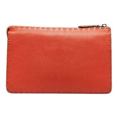Shop Fendi Selleria Orange Leather Clutch Bag ()