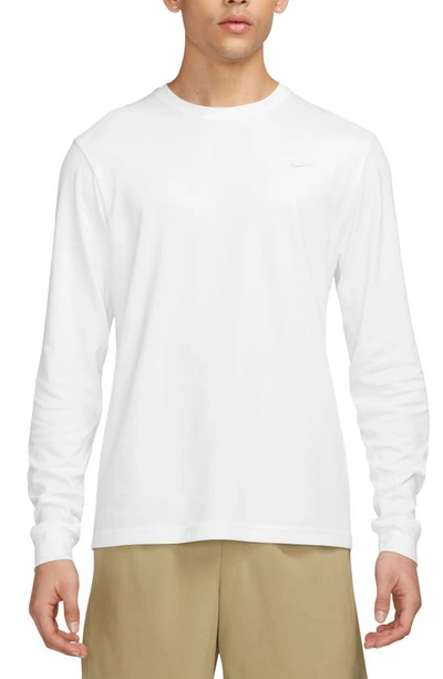 Shop Nike Dri-fit Primary Long Sleeve T-shirt In White/ White