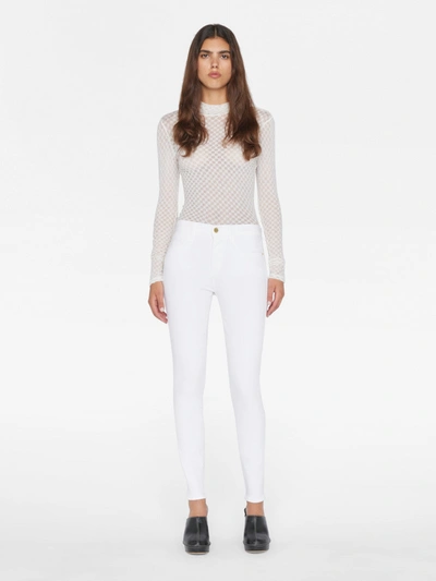Shop Frame Le High Skinny Jeans In White