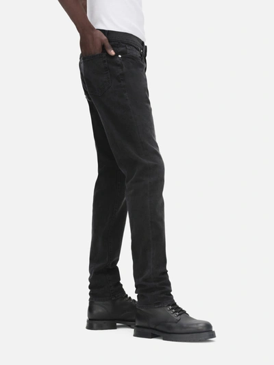 Frame Mid-rise Slim-fit Denim Trousers In Black