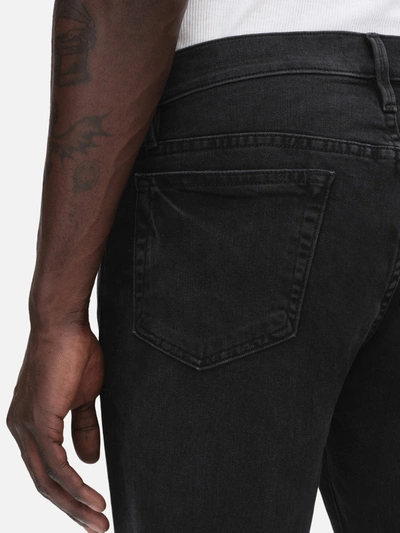 Frame Mid-rise Slim-fit Denim Trousers In Black