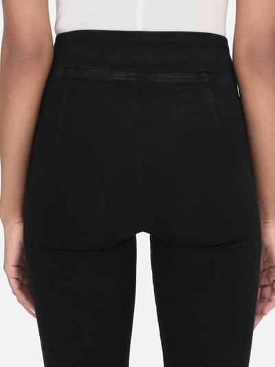 Shop Frame The Jetset Flare Jeans In Black