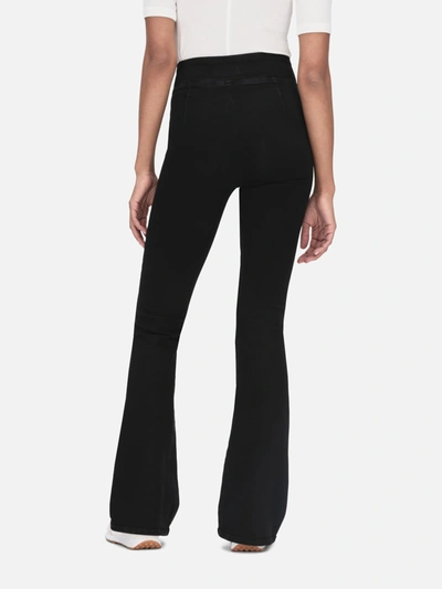 Shop Frame The Jetset Flare Jeans In Black