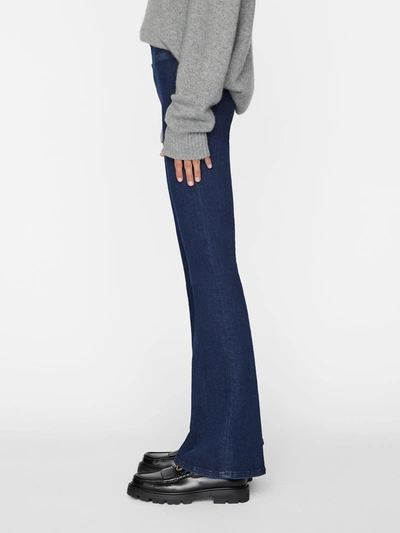 Shop Frame The Jetset Flare Jeans In Blue