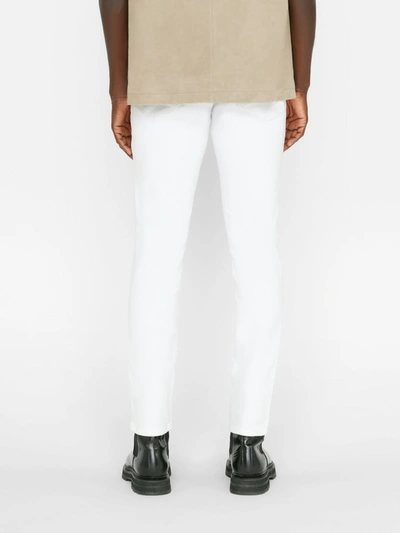Shop Frame L'homme Slim Crop Jeans In White