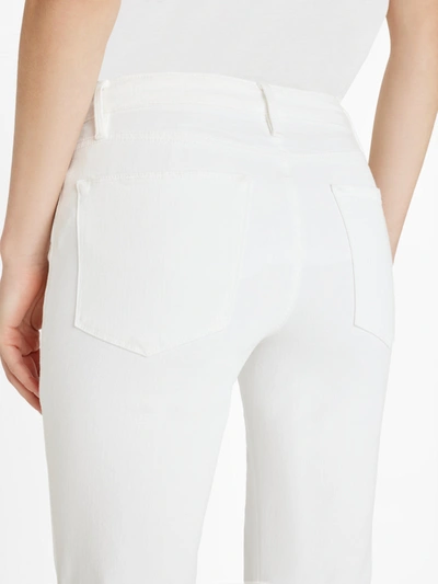 Shop Frame Le Easy Flare Jeans Blanc Denim In White
