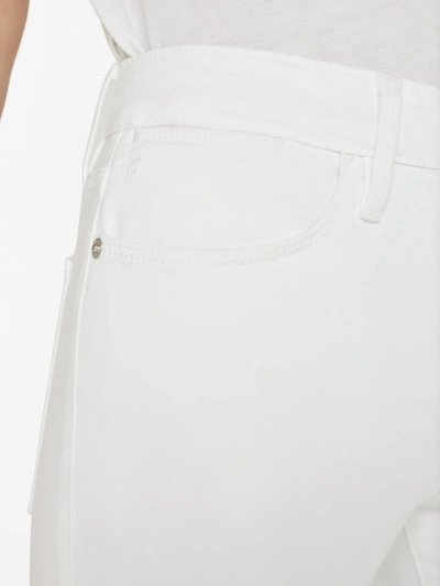 Shop Frame Le Easy Flare Jeans Blanc Denim In White
