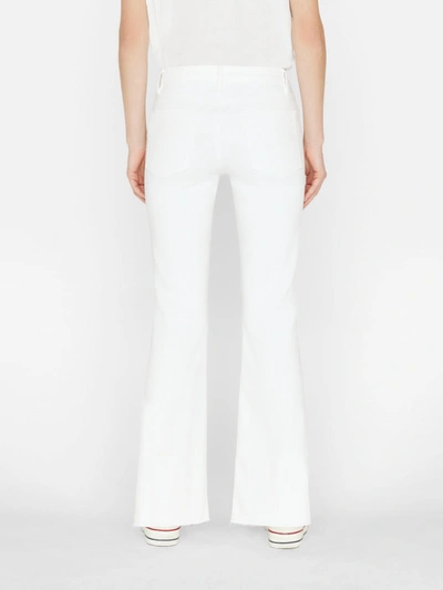 Shop Frame Le Easy Flare Jeans In White
