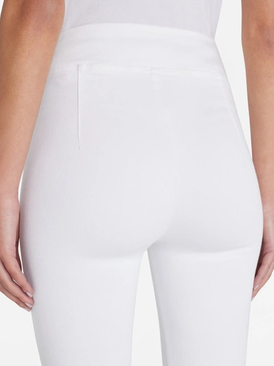 Shop Frame The Jetset Flare Jeans In White