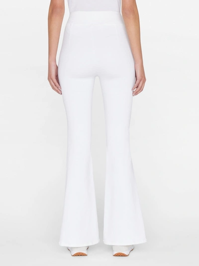 Shop Frame The Jetset Flare Jeans In White