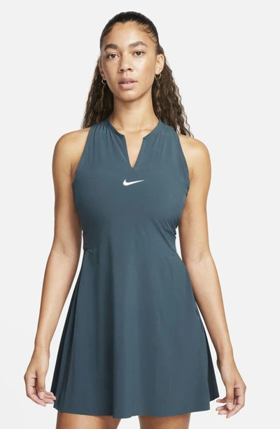 Shop Nike Club Dri-fit Racerback Dress In Deep Jungle/ White