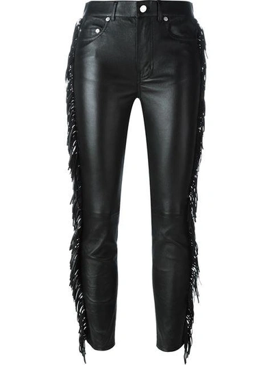 Shop Saint Laurent Fringed Leather Trousers In Black