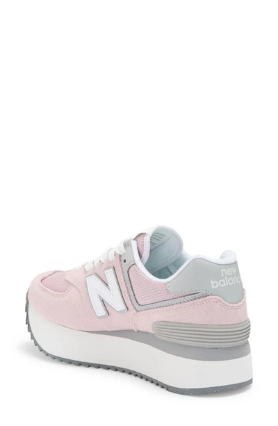 Shop New Balance 574 Sneaker In Stone Pink/ Rain Cloud