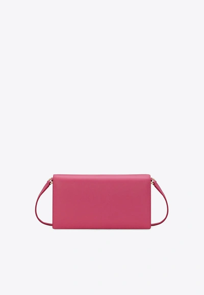 Shop Dolce & Gabbana Dg Logo Calf Leather Clutch In Lilac