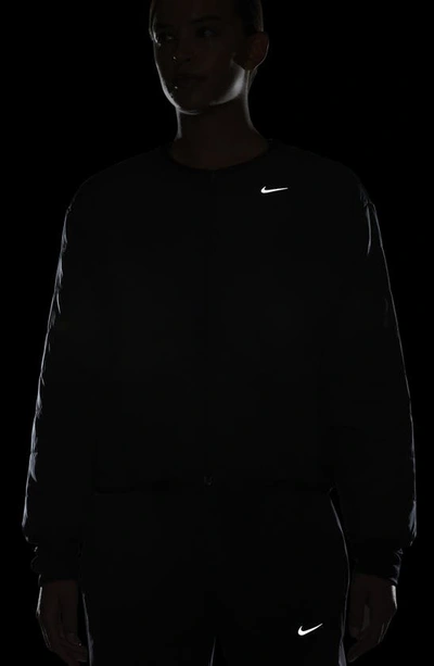 Shop Nike Therma-fit Swift Running Jacket In Black