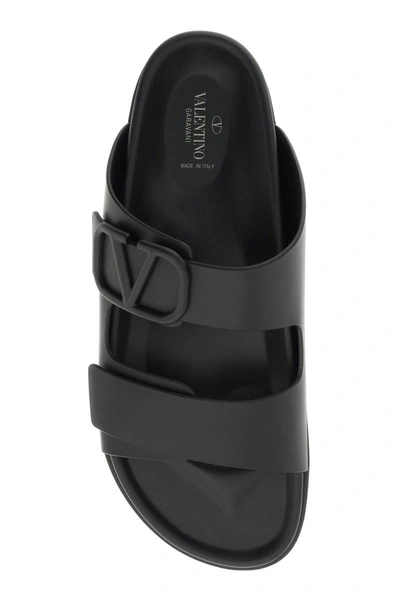 Shop Valentino Garavani Vlogo Leather Slides In Black