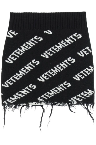 Shop Vetements Monogram Knit Skirt With Ripped Hem In Black