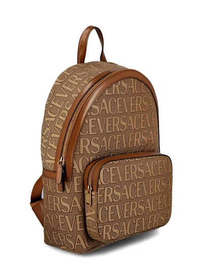 Shop Versace Handbags In Brown