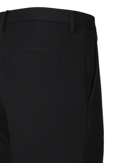 Shop Valentino Garavani Trousers In Black