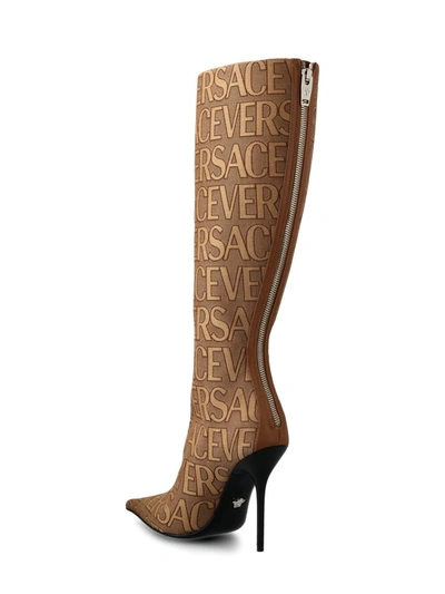 Shop Versace Boots In Brown Beige