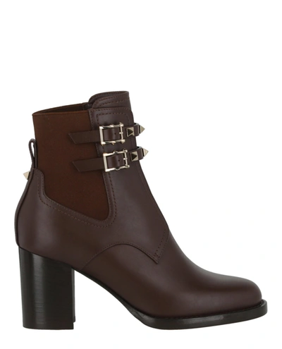 Shop Valentino Rockstud Calfskin Buckle-strap Ankle Boots In Brown