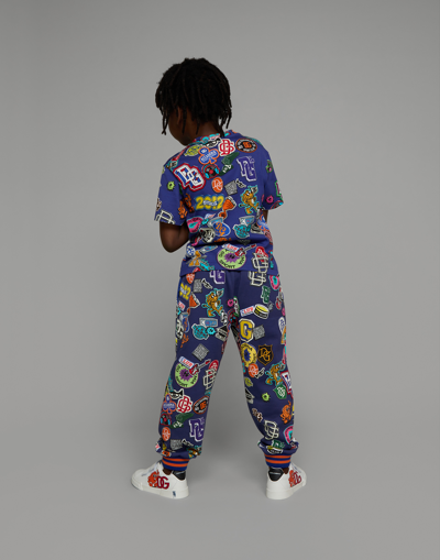 Shop Dolce & Gabbana Cotton Jogging Pants With Stickers Print In Blue