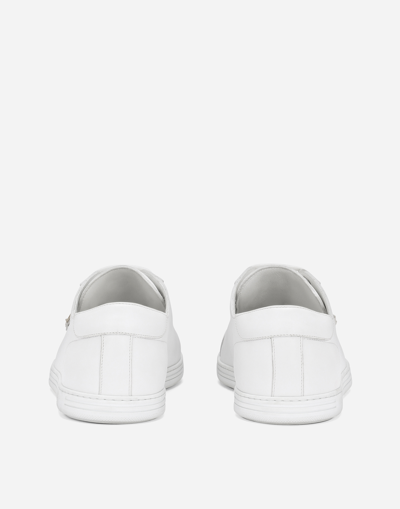 Shop Dolce & Gabbana Saint Tropez Calfskin Sneakers In White