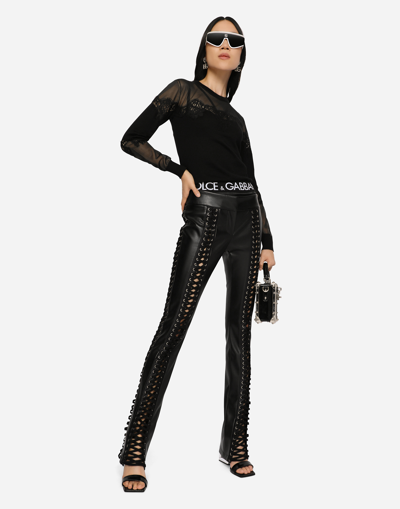 Shop Dolce & Gabbana Faux Leather Pants With Lacing And Eyelets In Black