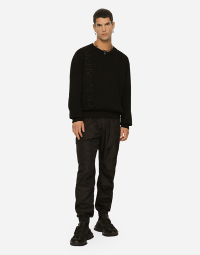 Shop Dolce & Gabbana Nylon Cargo Pants With Logo Tag In Black