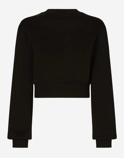 Shop Dolce & Gabbana Cropped Jersey Sweatshirt With Embroidered Dg Patch In Black