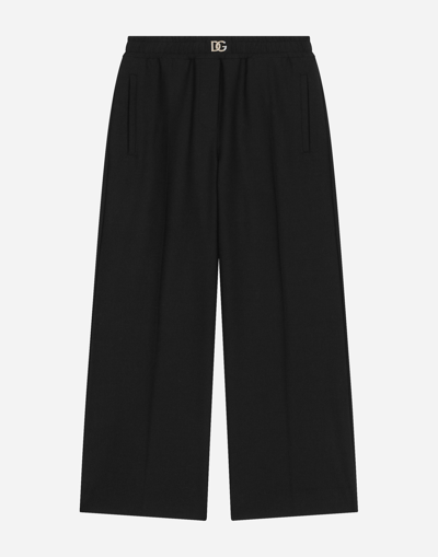 Shop Dolce & Gabbana Wool Palazzo Pants With Stretch Waistband In Black