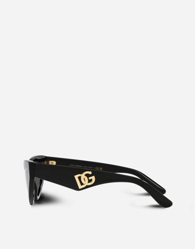 Shop Dolce & Gabbana Dg Crossed Sunglasses In Black