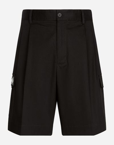 Dolce & Gabbana Stretch Gabardine Cargo Bermuda Shorts With Logo Plaque In Blue