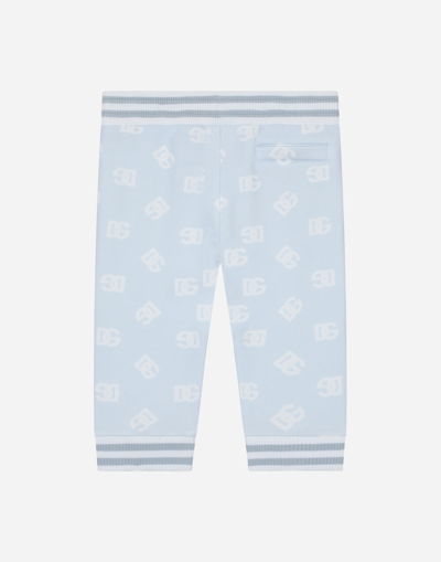 Shop Dolce & Gabbana Jersey Jogging Pants With Dg Logo Print In Azure
