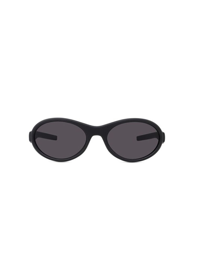 Shop Givenchy Eyewear Oval Frame Sunglasses In Black