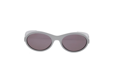 Shop Givenchy Eyewear Oval Frame Sunglasses In Grey