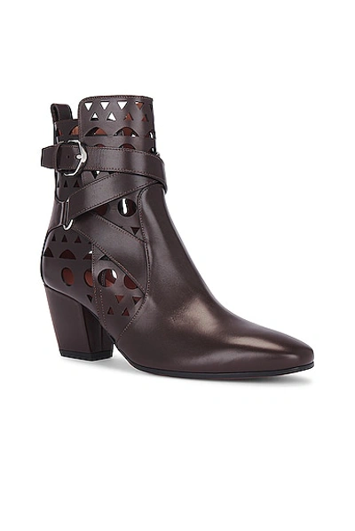Alaïa Perforated Leather Vienne Booties With Ankle Strap 6cm In Marron Fonce