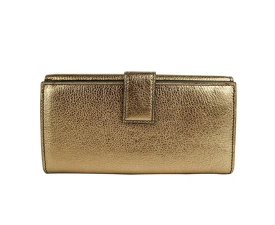 Alexander Mcqueen Women's Gold Metallic Leather Flap With Skull Wallet In Gold